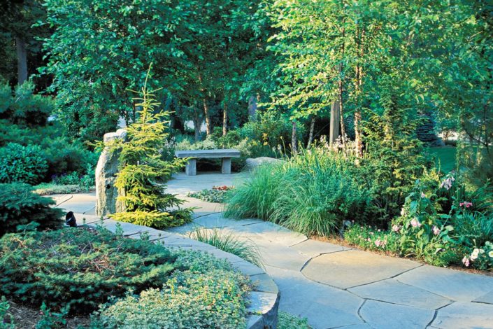 Irregular Bluestone Patio by Cording Landscape Design in NJ